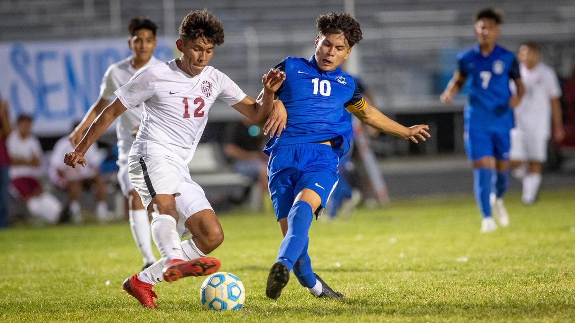 Caldwell senior Damian Arguello slips a pass by Columbia’s Horacia Guerrero on Tuesday. Arguello scored his 99th career goal in the 4-1 victory.