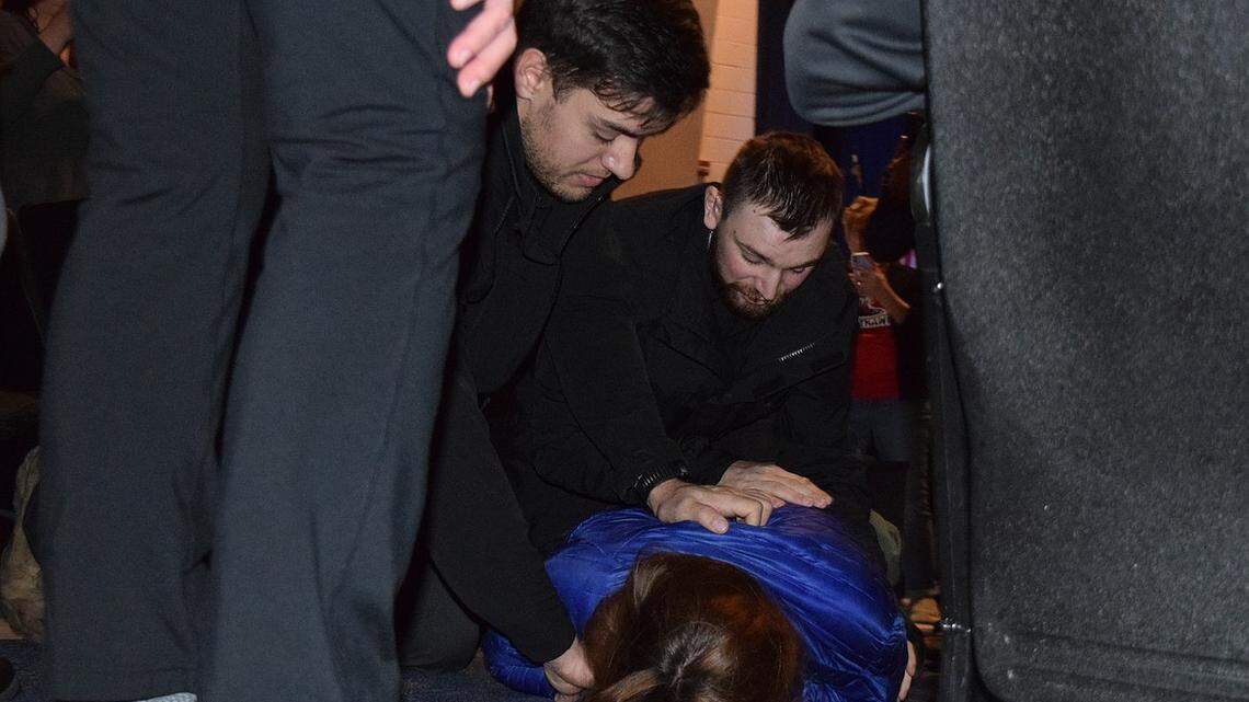 Borrenpohl is seen held against the ground after Saturday’s Legislative Town Hall, hosted by the KCRCC, turned volatile.