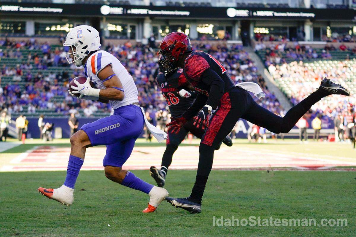 Boise State wide receiver Khalil Shakir (2) catches a pass for a touchdown ahead of San Diego State cornerback Noah Tumblin (10) during the first half of an NCAA college football game in Carson, Calif., on Nov. 26.