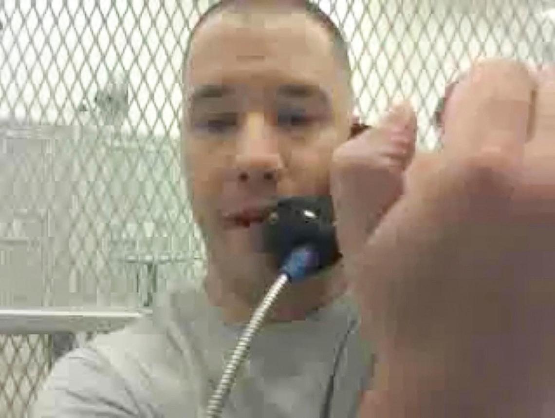 Bobby Templin holds his hand up, showing he is unable to close his thumb, while recording a video from inside the Idaho Maximum Security Institution. He has waited for months to get medical attention for his broken hand.