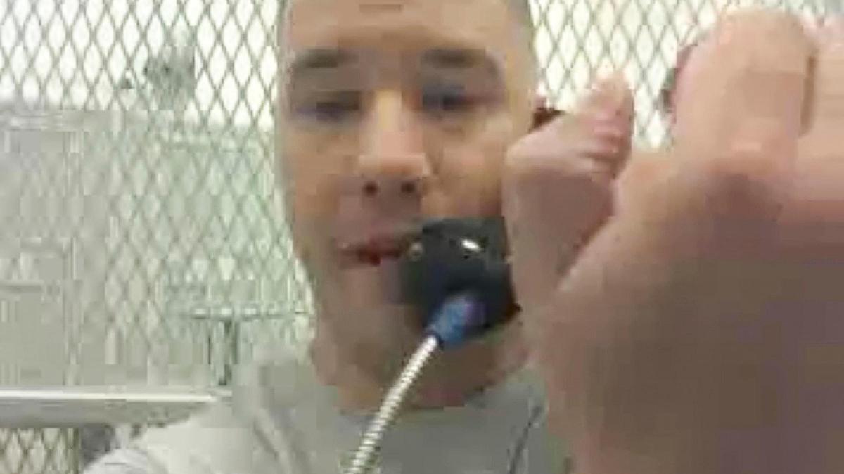 Bobby Templin holds his hand up, showing he is unable to close his thumb, while recording a video from inside the Idaho Maximum Security Institution. He waited for months to get medical attention for his broken hand.