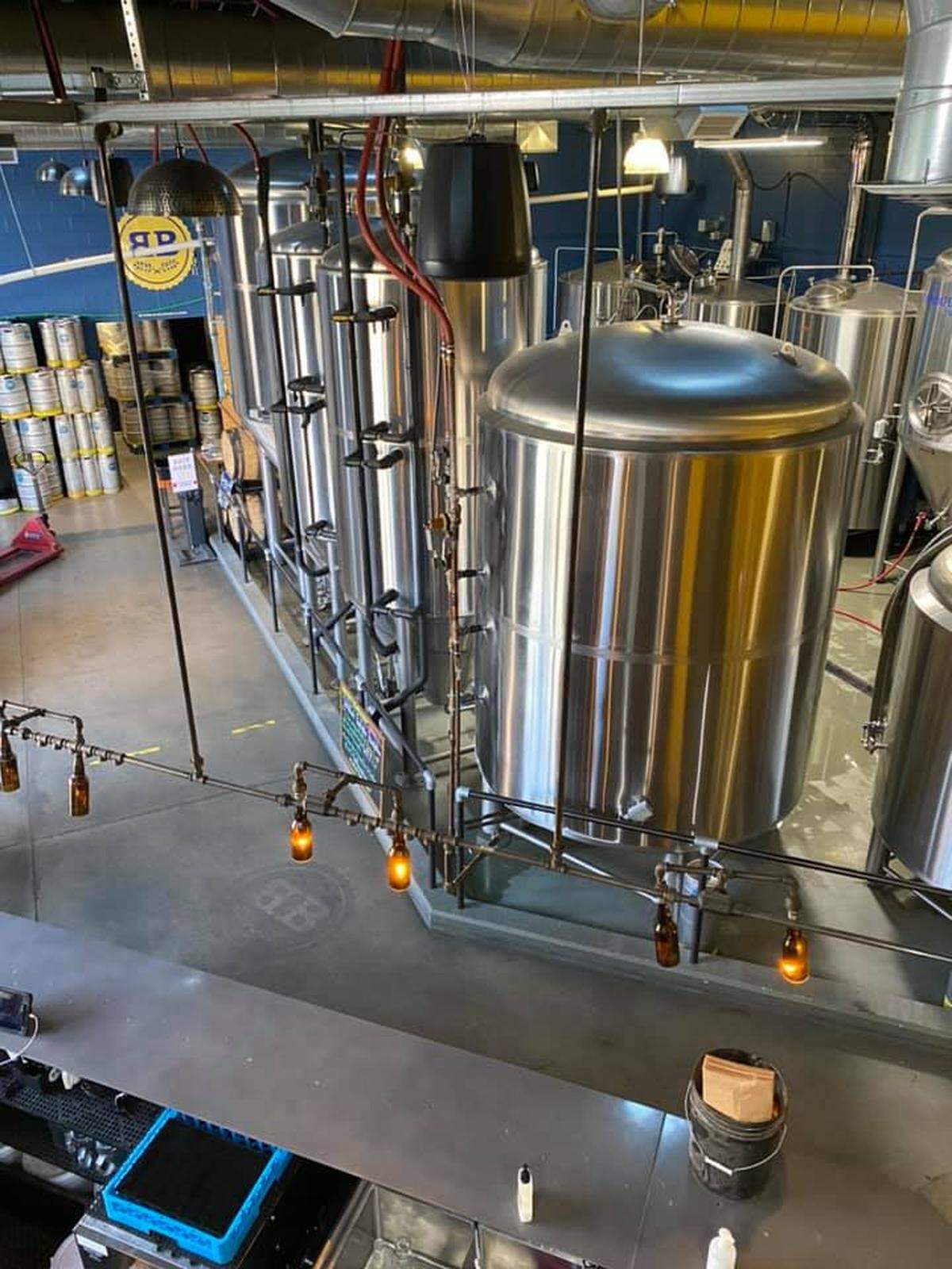 Beer production equipment is located right next to the taproom area in Boise Brewing’s current space.
