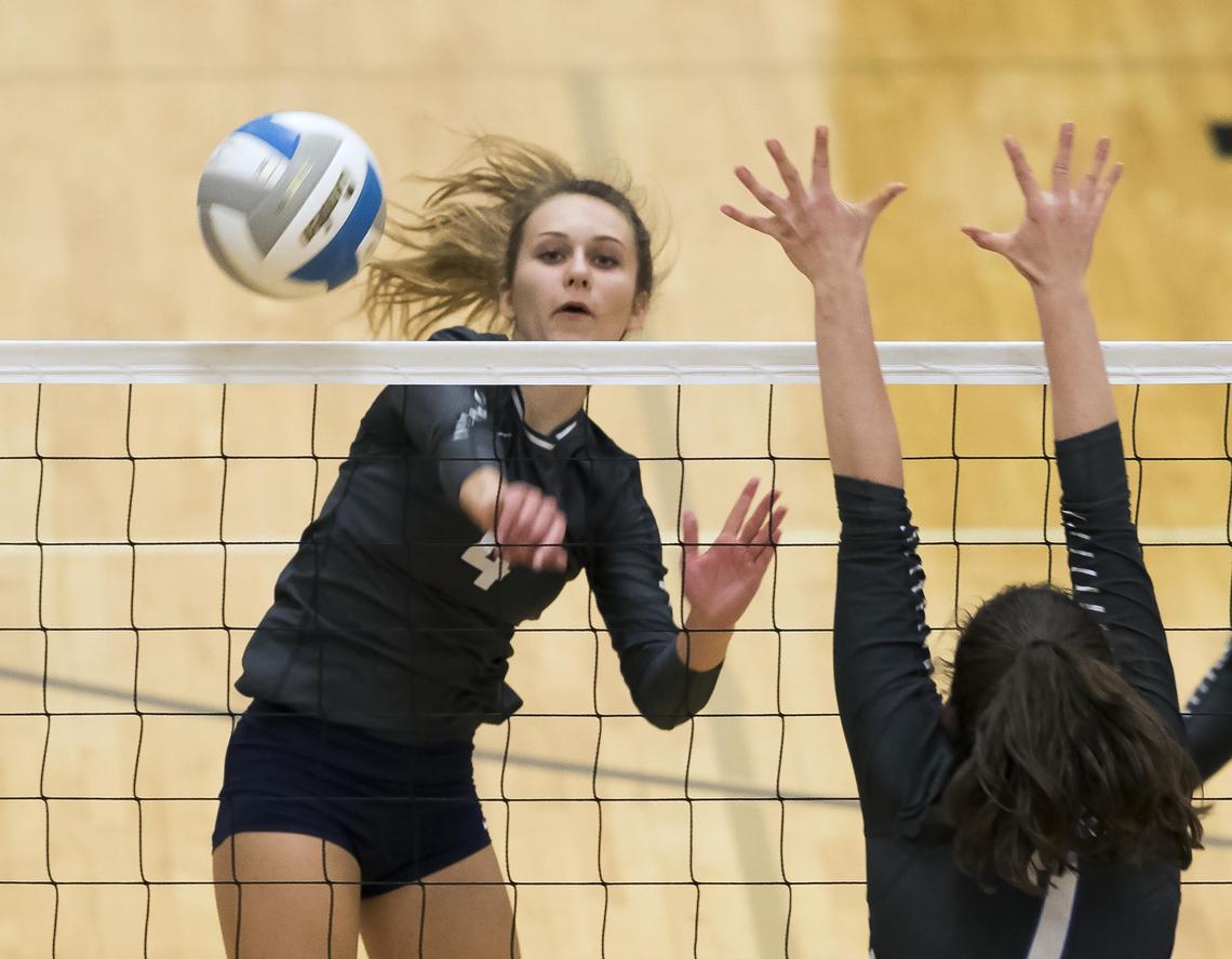 Skyview’s Karen Murphy fires a shot down the line for a point during last year’s district championship match against Timberline.