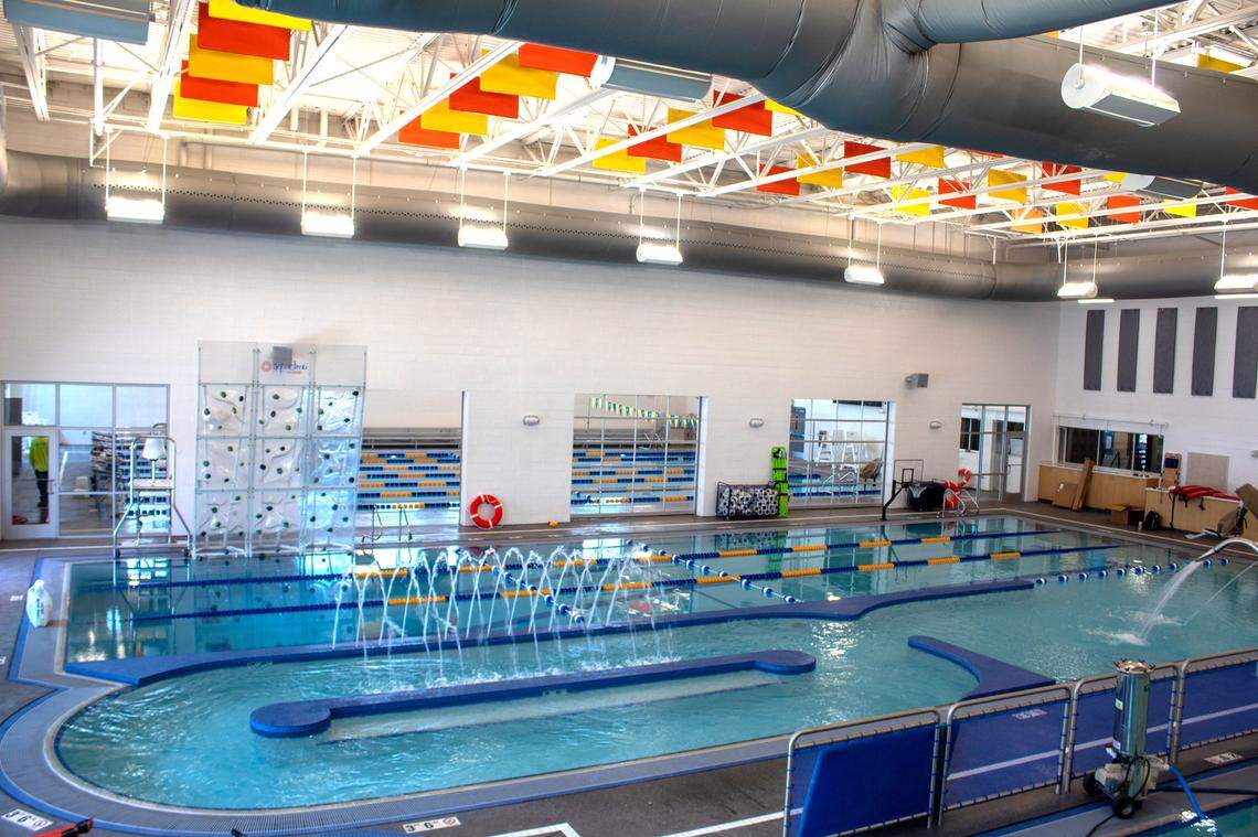 The center includes this pool with three lap lanes, a lazy river, and a recreational swim area.