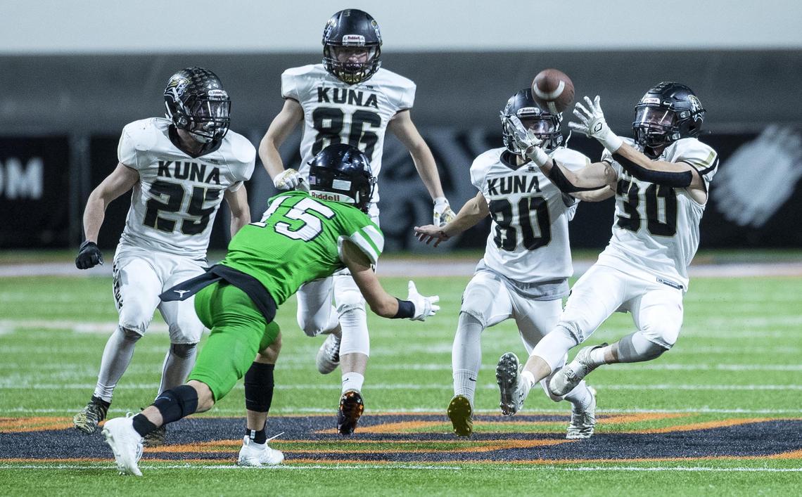 Kuna senior Tyler Cobb gathers the football on a surprise onside kick against Blackfoot in the 4A state football championship Saturday, Nov. 23, 2019 at Holt Arena in Pocatello.