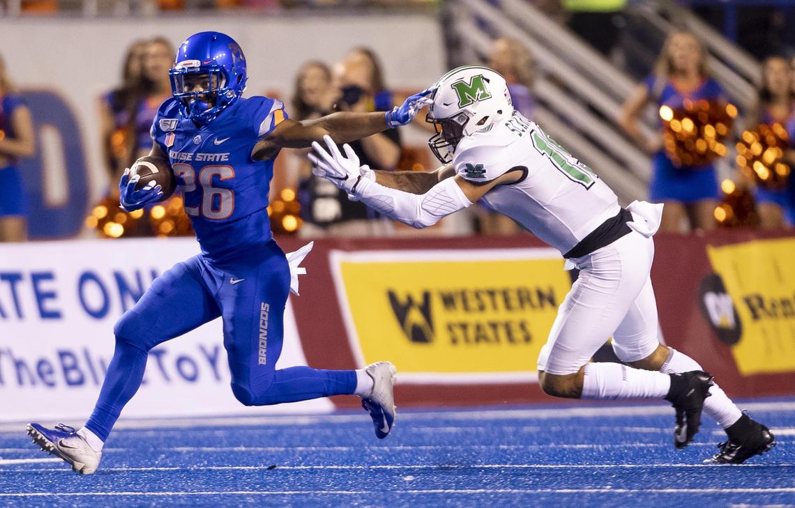 Boise State cornerback Avery Williams (26) returns a punt in Boise State’s home opener against Marshall on Sept. 6. Williams is one of two players in the country this fall with two punt returns for touchdowns.