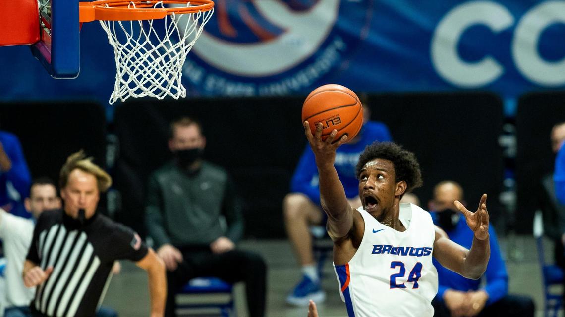 Boise State forward Abu Kigab, scoring after a steal in a game against Air Force in January, will return to the Broncos for an extra season.