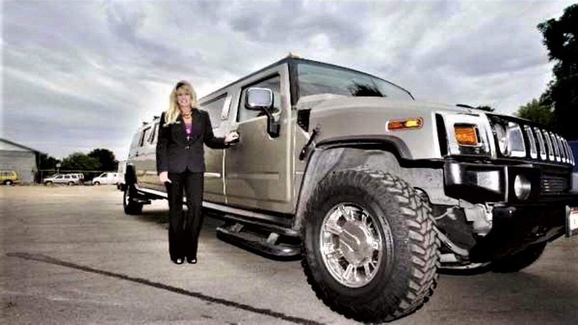 Christine Bennett, the former owner of Boise’s Showcase Limousine, next to the company’s Hummer limo.