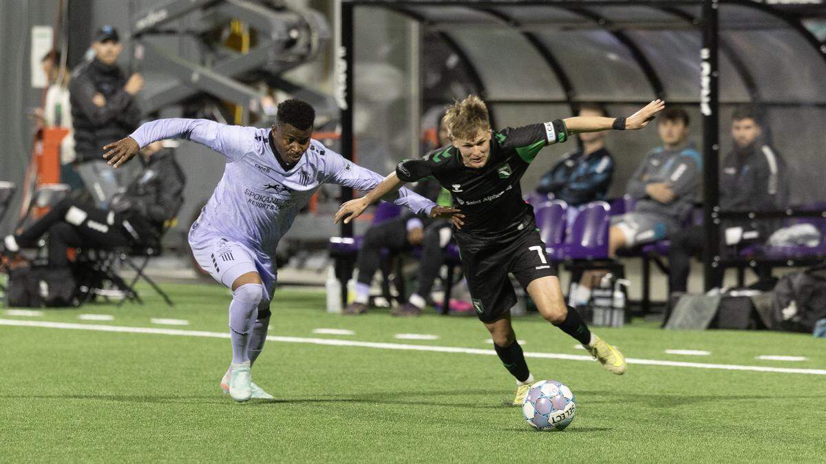 Spokane Velocity’s Lucky Opara, left, tries to track down AC Boise’s Blake Bodily on Saturday. 
