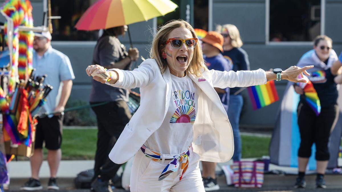 Boise Mayor Lauren McLean interacts with the crowd at the Boise Pride parade.