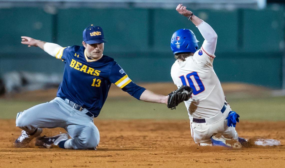 Boise State base runner Cole Posey steals second base as North Colorado’s Ben McKay just misses the tag Friday at Memorial Stadium.