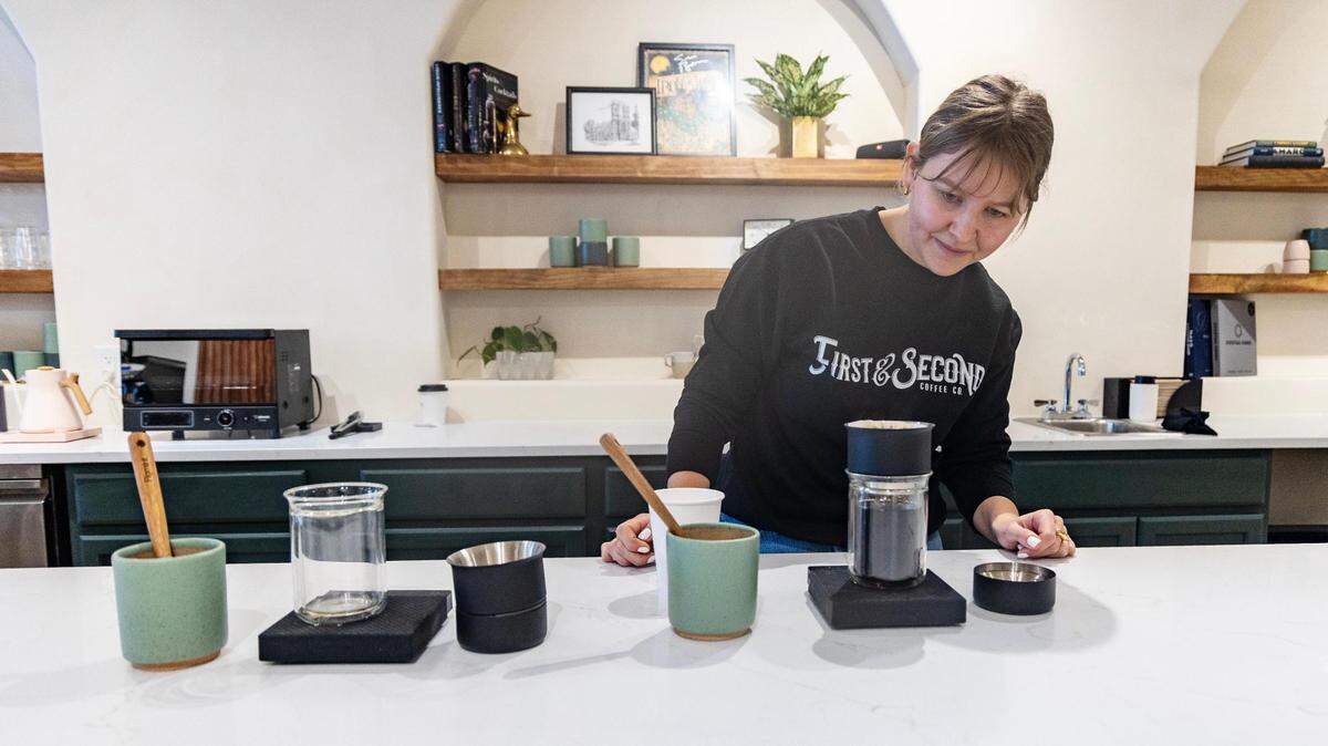 Mae Wilson makes coffees on opening day at First & Second Coffee Co. on Dec. 20 in downtown Nampa.
