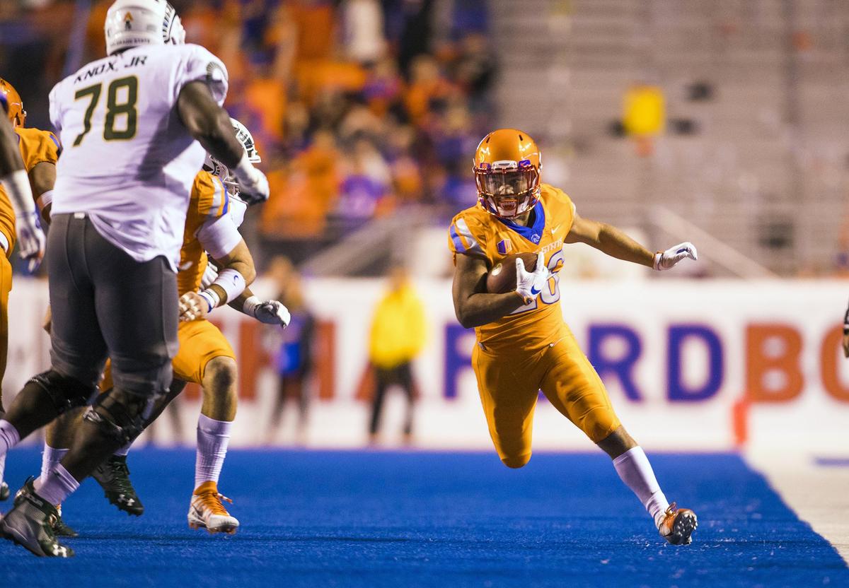 Boise State cornerback Avery Williams runs the ball after a third quarter interception last season against Colorado State. 