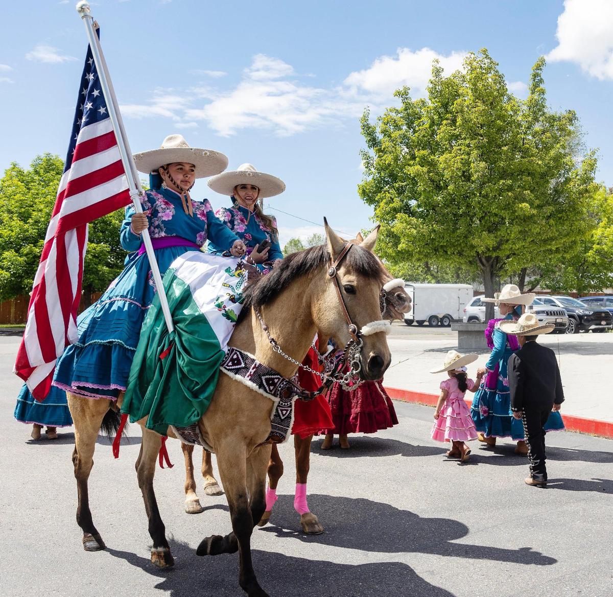 Escaramuza equestrian rider Pamela De La River of Melba carried the United States flag during a performance at the inauguration ceremony.