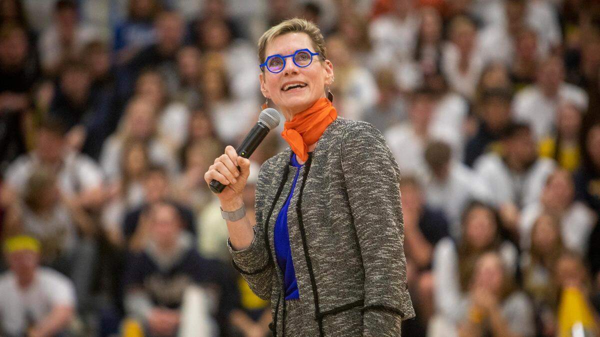 Boise State President Marlene Tromp, seen speaking last winter at a high school basketball game, said Wednesday that during the pandemic, “we learned things that we’ll take with us into future years that have made us a better university.”