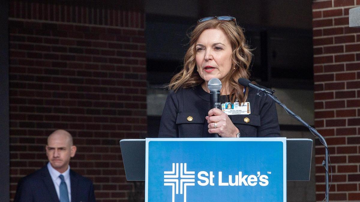 Nicole Brown, chief operating officer of St. Luke’s Center for Orthopedics and Sports Medicine, speaks at a ribbon-cutting ceremony on Thursday.