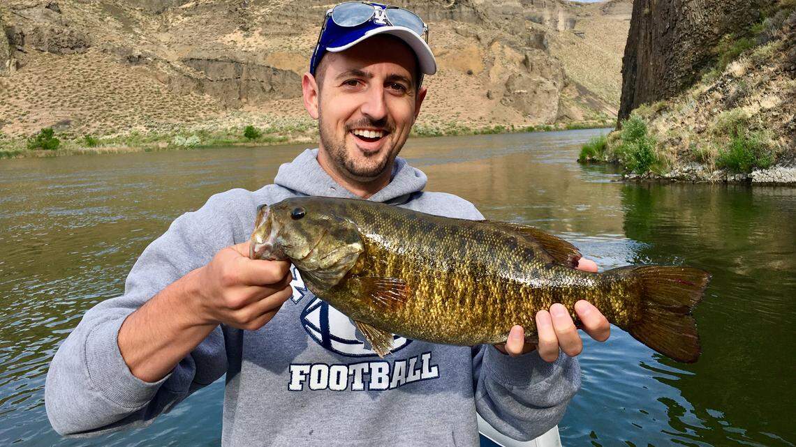 Unorthodox methods — like trolling a plastic worm off the back of the boat — can produce memorable catches like this monster smallmouth bass caught by Justin Dalme of Kuna.