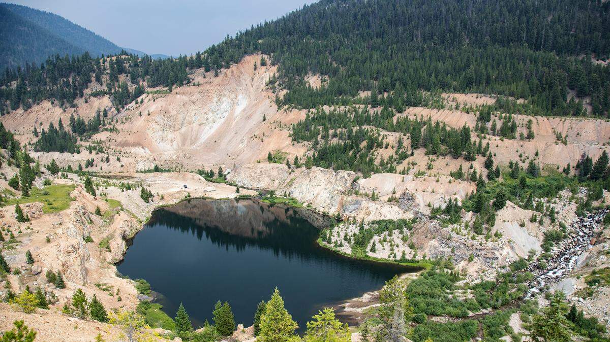 The Yellow Pine Pit is one of three open pits destined for gold and antimony mining under a proposal from Perpetua Resources. Mining in the Stibnite area dates to the late 19th century.