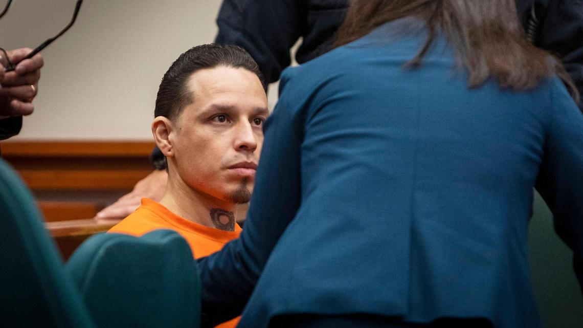 Erik Osuna listens to his defense attorney as his sentencing begins in 4th District Court, Thursday, Oct. 20, 2022, at the Ada County Courthouse in Boise. Osuna pleaded guilty to first-degree murder in the death of his 9-year-old son, Emrik Osuna, who died in September 2020.