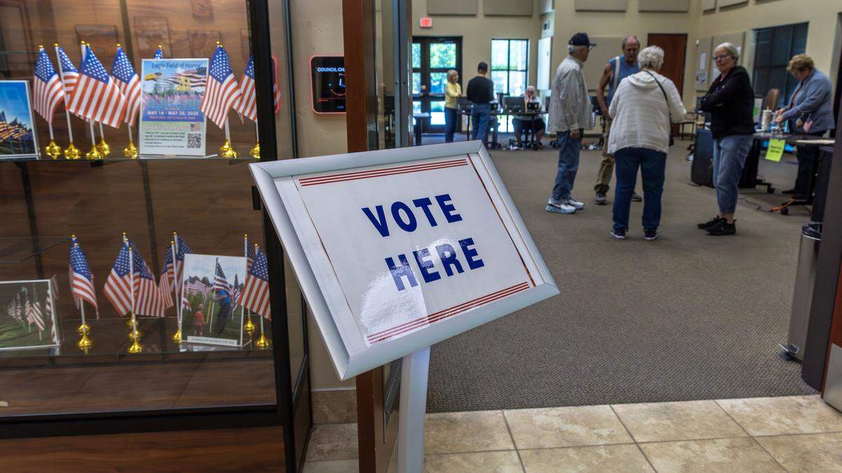 Voters cast their primary ballots at the combined precincts 1409/1410 at Eagle City Hall, Tuesday, May 19, 2026.