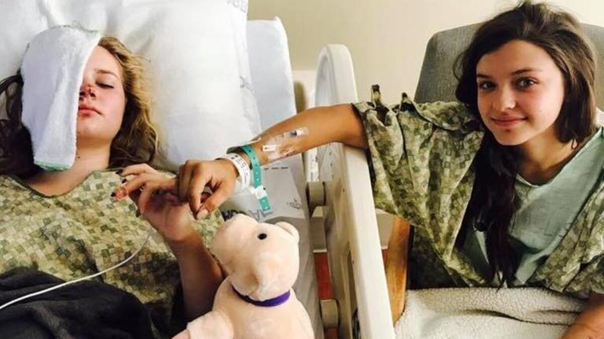 Abby and Kendall McMillan are shown in a Treasure Valley hospital after the accident.