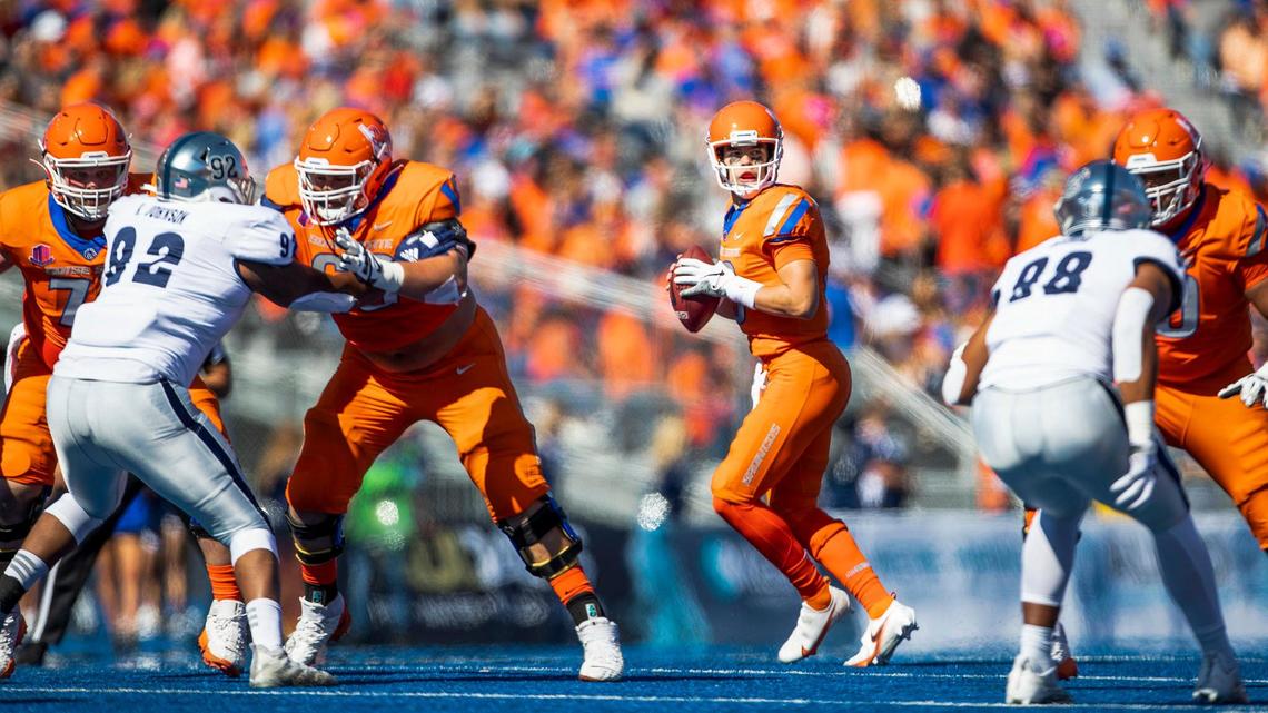 Boise State quarterback Hank Bachmeier throws a pass against the Nevada defense during the first half of the Broncos’ 41-31 loss on Saturday.