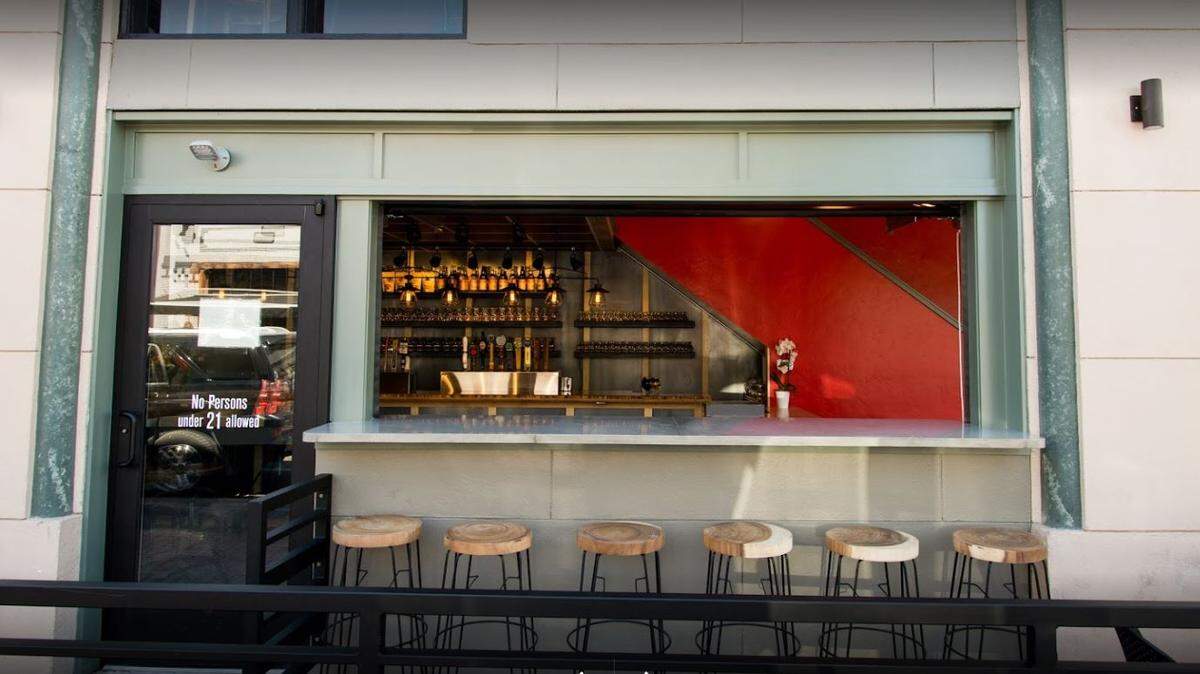 Meriwether Cider House has a bar top that opens to the outdoor patio.