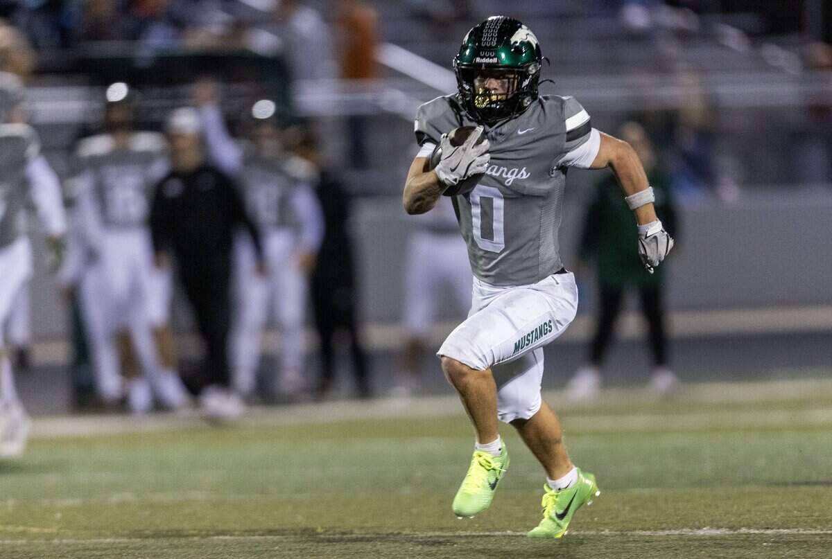 Eagle running back Noah Burnham breaks through Timberline's defense for a long touchdown run in the 6A SIC championship game at Eagle High School, Friday, Oct. 24, 2025.