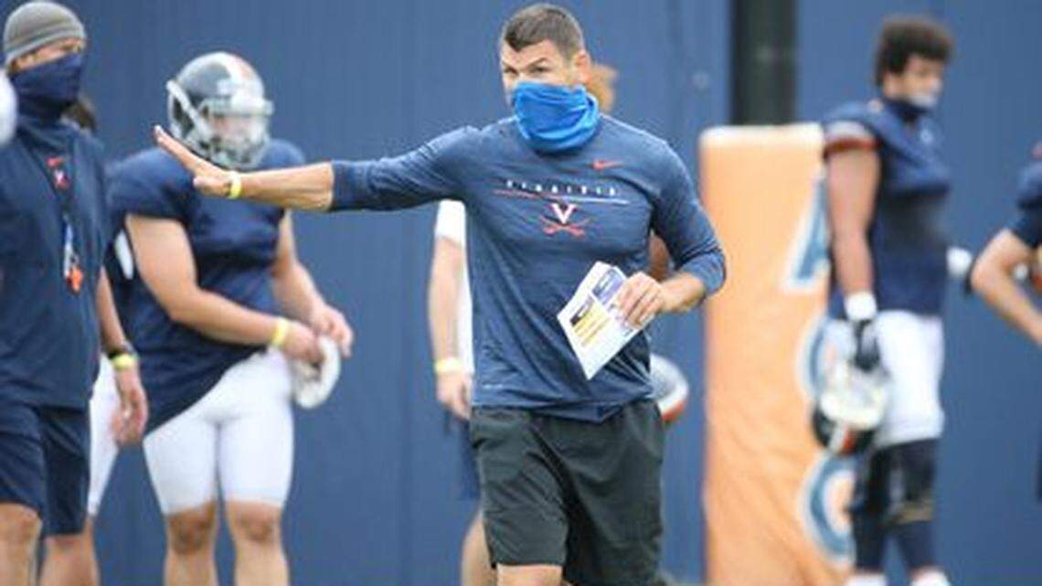 Boise State has hired former Virginia assistant coach Kelly Poppinga as co-special teams coordinator and edge coach.