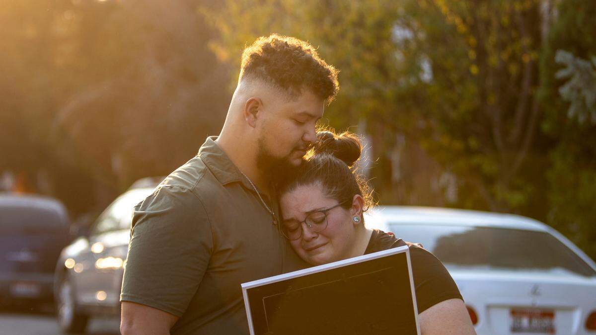 Diamond and Alexis Cooley hold a photo of their son, Onyxx, who died in his sleep in February in eastern Idaho. The coroner responsible for the baby’s death investigation chose not to do an autopsy or take other steps recommended by national experts in infant deaths. Idaho law didn’t require him to follow national standards, the coroner told ProPublica.