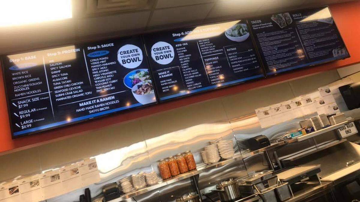Customers would get in line, create a bowl, order a taco or choose sushi rolls at Naked Fins.