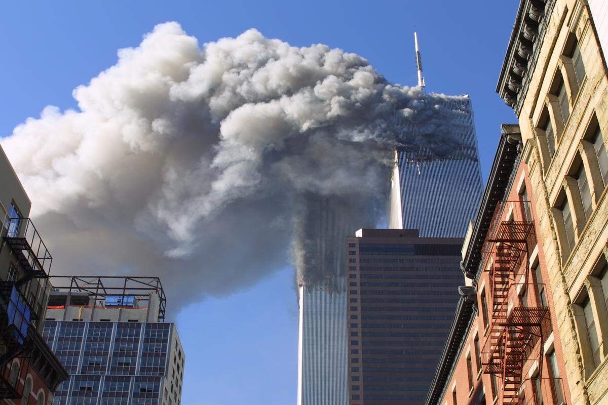 In this Sept. 11, 2001 file photo, the twin towers of the World Trade Center burn after hijacked planes crashed into them in New York.