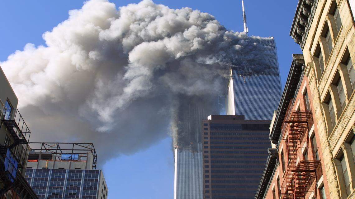 In this Sept. 11, 2001, file photo, the twin towers of the World Trade Center burn after hijacked planes crashed into them in New York.