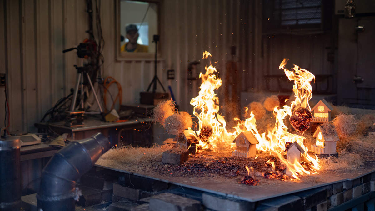 University of Idaho engineering students designed the Dragon 2.0, a machine used to produce embers for observing and testing how they interact with buildings in controlled environments. The generator blows embers to mimic real wildfire conditions.