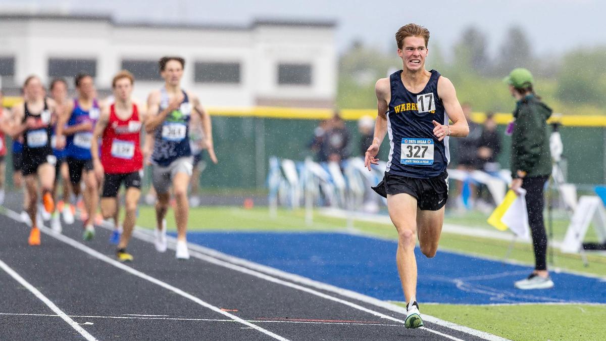 Nate Stadtlander of Meridian finishes in first place in the 6A boys 1,600 meters.