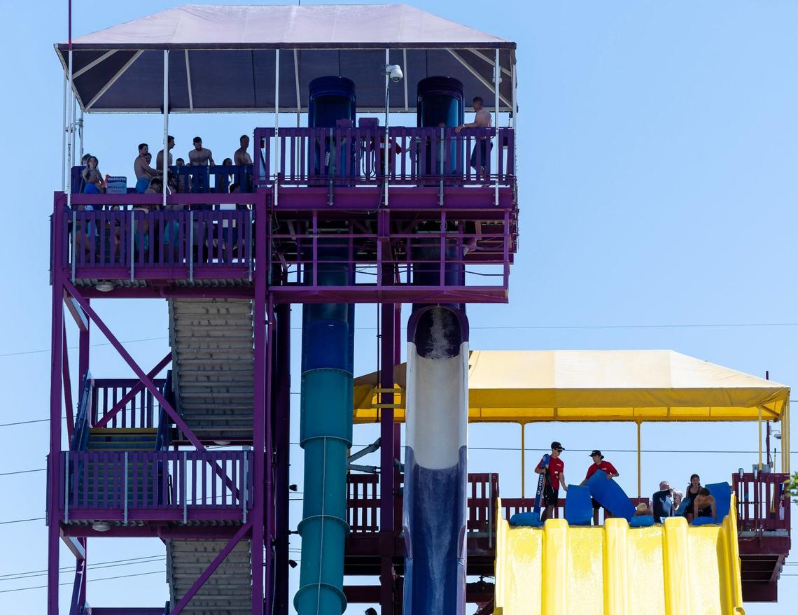 People wait in line for water slides on Friday, June 21.