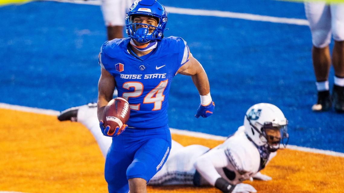 Boise State running back George Holani scores on a 17-yard pass play just before halftime to give the Broncos a 28-0 lead Saturday, Oct. 24, 2020 at Albertsons Stadium in Boise.
