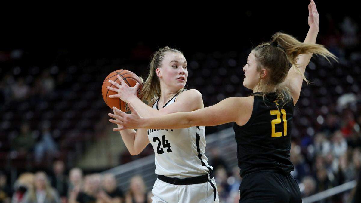 Shelley senior Brinley Cannon, left, signed with BYU in November.