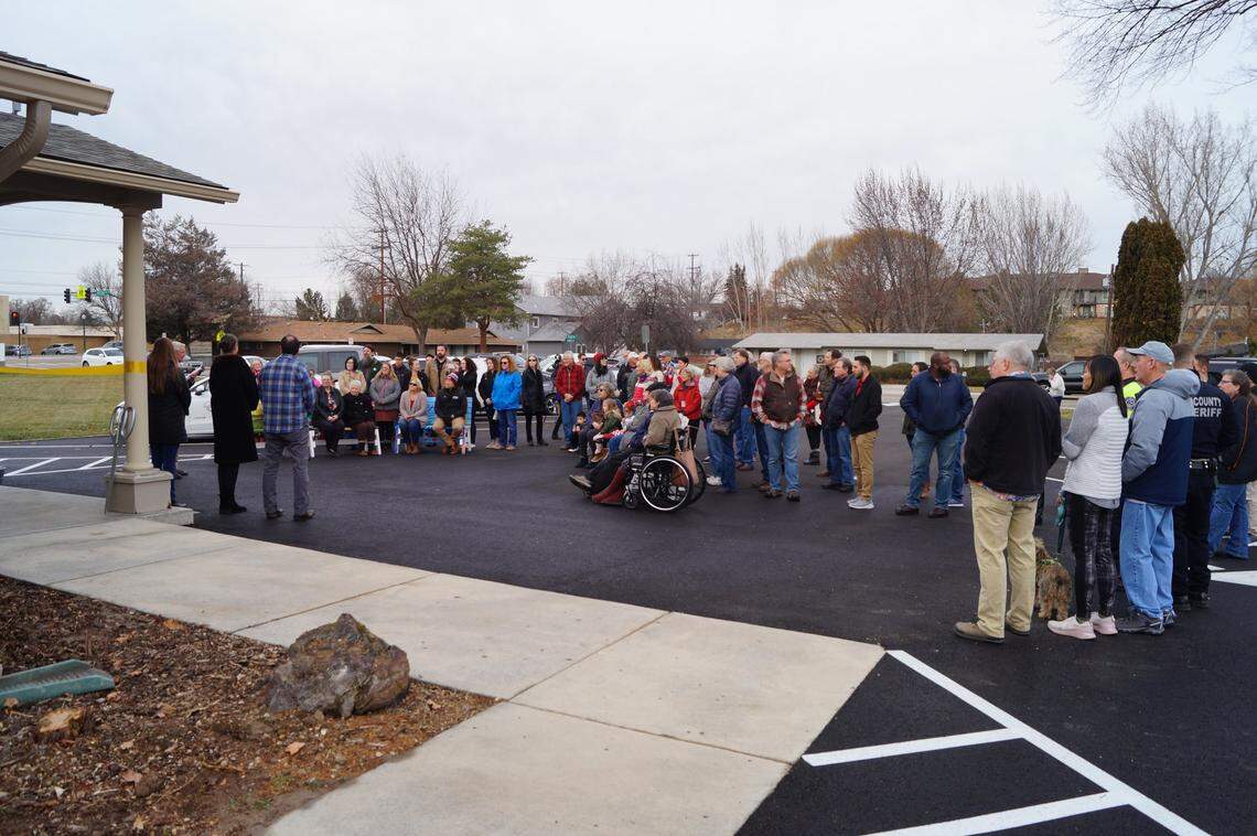 A crowd gathers at 175 E. Mission Drive to celebrate the opening of the new Eagle Landing community center in December.