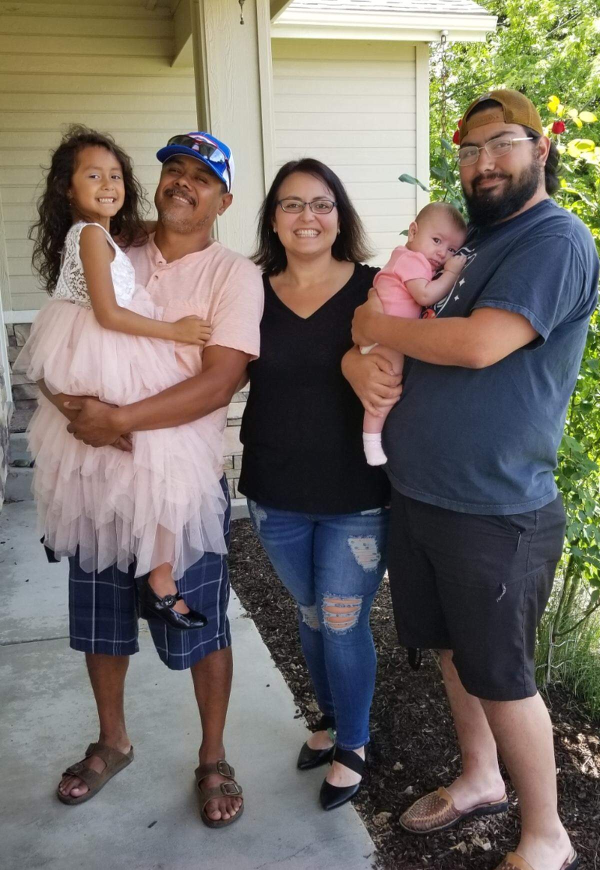 Several members of the Morales and Buffington family came down with COVID-19 in late June. Amanda Morales, center, and husband Carlos, left, got tested shortly after her son, Bryson Buffington, right, was admitted to the hospital with COVID-19. Buffington’s infant daughter also tested positive. Morales said her 6-year-old daughter did not test positive, but other children in their household did.