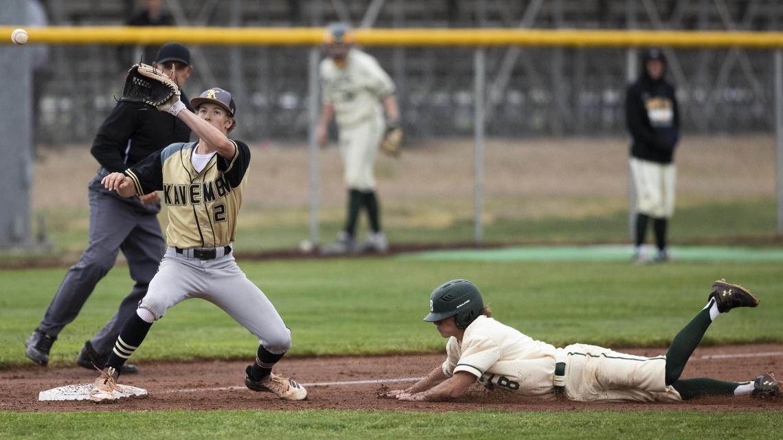 Kuna third basemen Kaeden Schutz, left, is one of seven Kavemen elected to the 4A SIC all-conference baseball team.