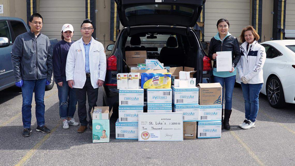 Idaho College of Osteopathic Medicine student Lei Ye, third from left, and members of the Idaho Chinese Organization collected medical supplies for front-line medical workers fighting the coronavirus outbreak.