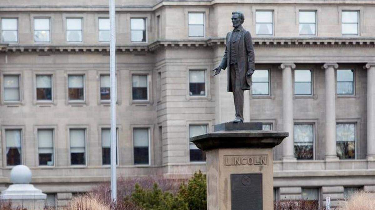 An Abraham Lincoln statue stands outside the Idaho Capitol in Boise.