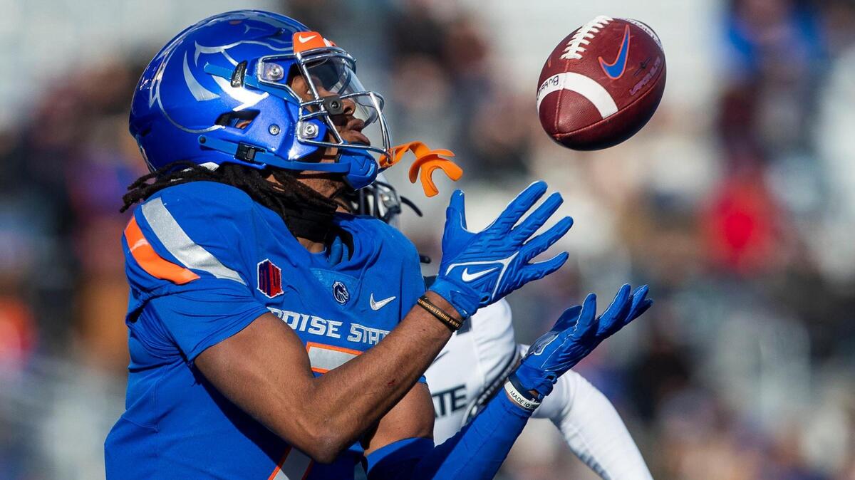Boise State wide receiver Latrell Caples catches a 50-yard touchdown pass from quarterback Taylen Green in the first half of the Broncos’ win over Utah State on Nov. 25. Caples leads the Broncos with 45 catches and 462 yards this season.