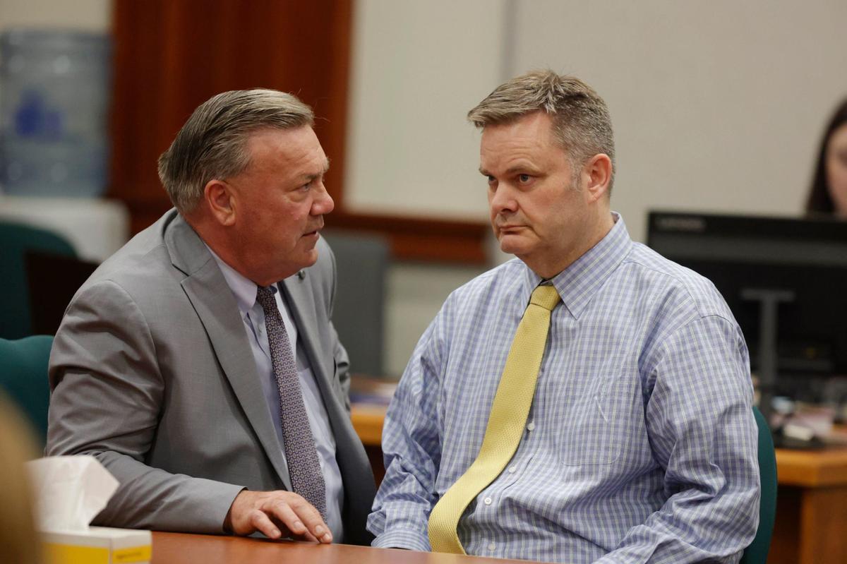 Chad Daybell, right, talks with defense lawyer, John Prior, before his verdict was read at his murder trial at the Ada County Courthouse in Boise on Thursday.