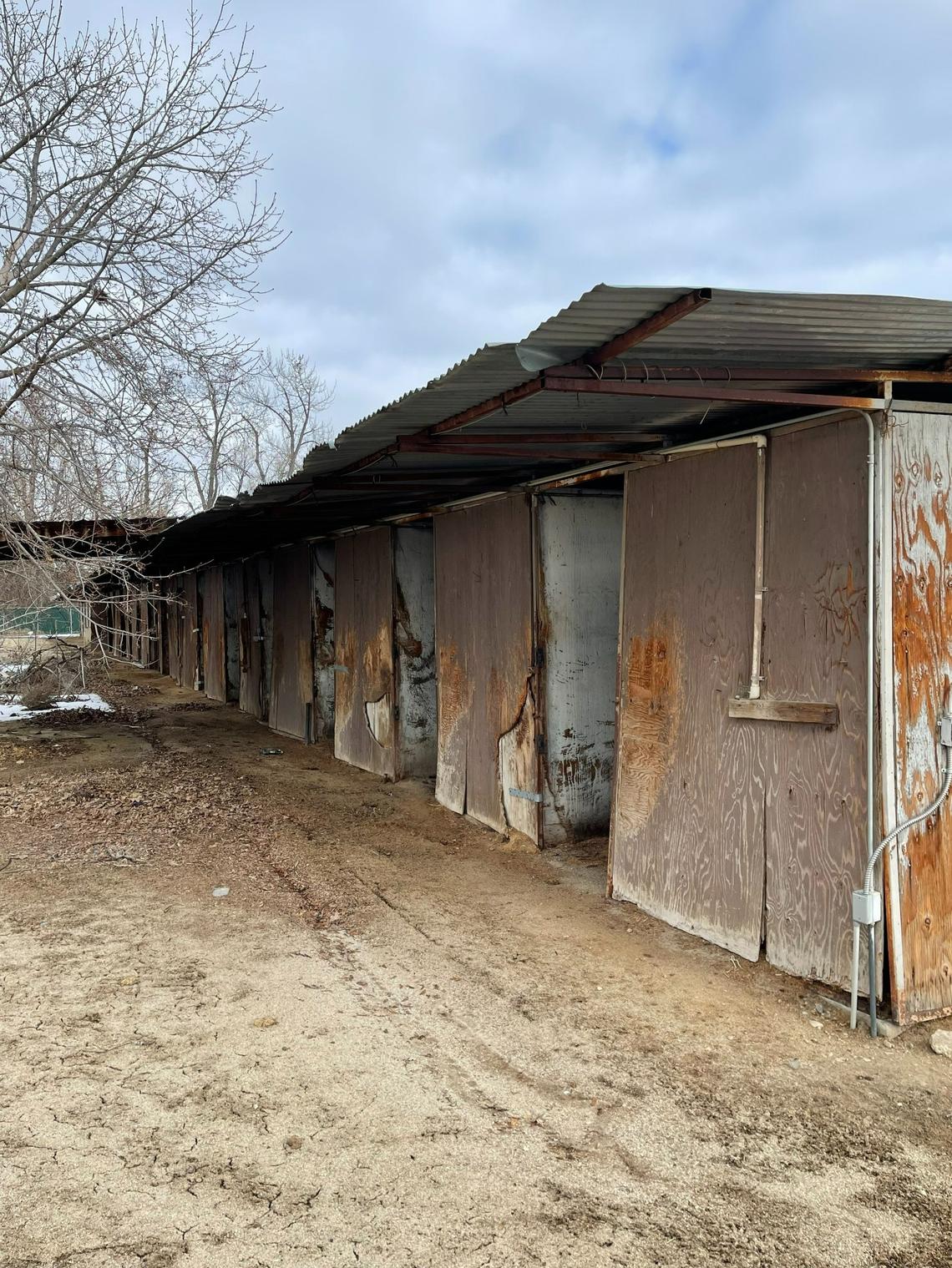 Dilapidated horse stables, which Ada County plans to demolish later this year to make way for a proposed park and recreation area.