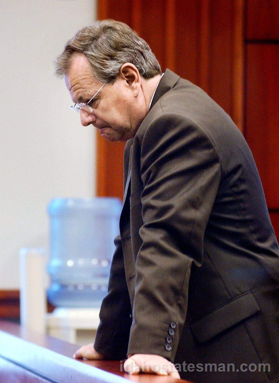 Former Boise Mayor Brent Coles waits for the court session to start at the Ada County Courthouse in 2003, where he was in court facing misdemeanor charges of bribery and corruption.