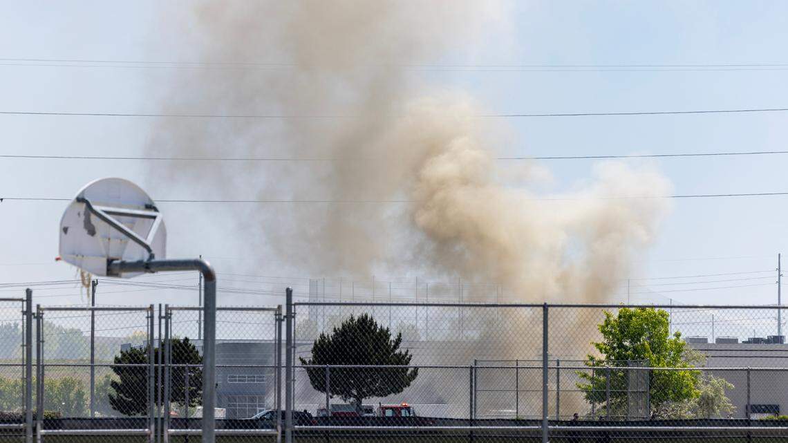 Fire crews respond to a fire along a railroad in Meridian south of Lewis and Clark Middle School.