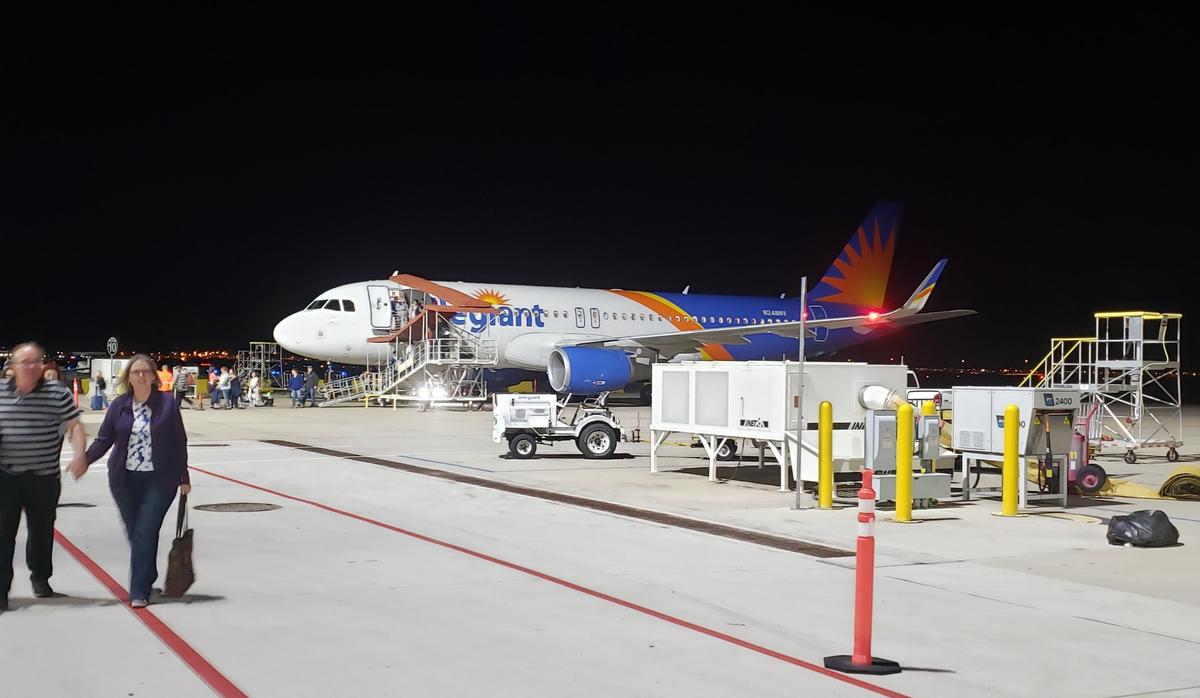 Passengers from an Allegiant Air flight from Boise walk from the plane at Phoenix-Mesa Gateway Airport in March. The Las Vegas airline will add nonstop service from Boise to John Wayne Airport in Santa Ana, California, in February.