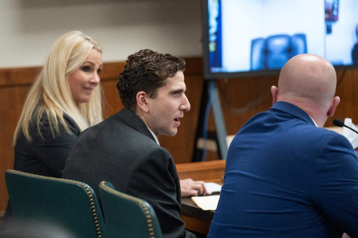 Bryan Kohberger, center, is accused of killing four University of Idaho students in November 2022. Led by attorney Anne Taylor, left, his defense is prepared to argue DNA evidence was planted, according to a recent court filing from the prosecution.